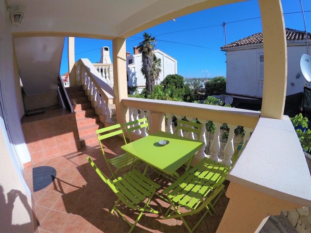 Orange City Apartment'S Repic Biograd Na Moru Buitenkant foto
